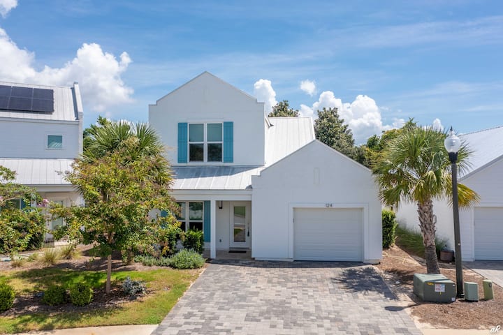 Villa Blue, a white 3-bedroom beach house with blue shutters near Pier Park, Panama City Beach